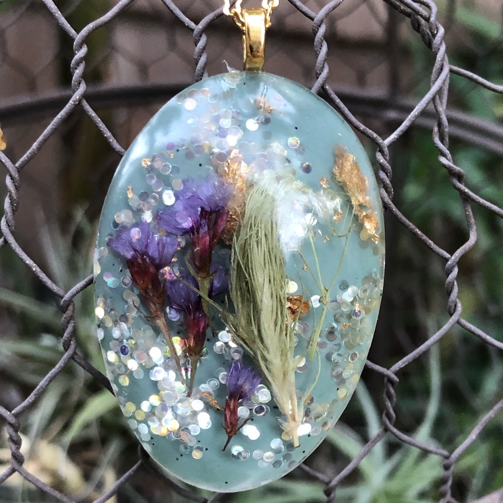 Handmade by me teal egg shaped necklace